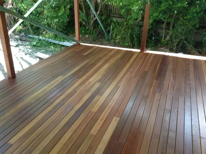 Finished hardwood deck with even board spacing