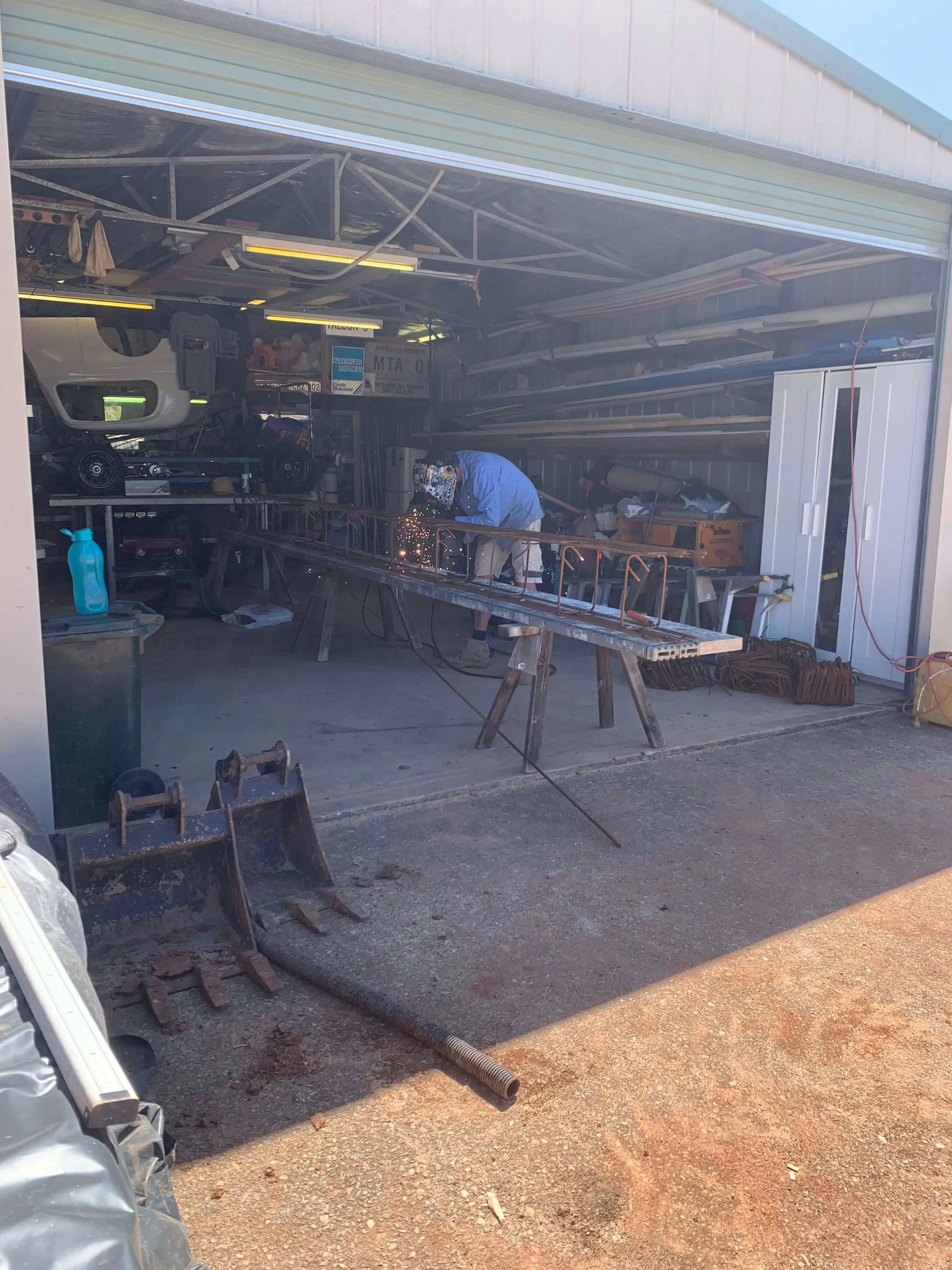 Steel being welded and fabricated in the workshop for a residential job